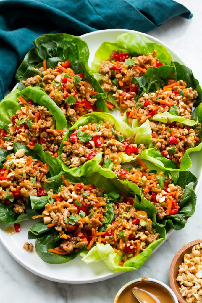 The image showcases Thai-Inspired Turkey Lettuce Wraps